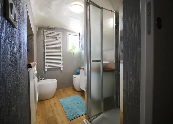 Апартаменты Ai Piedi Della Pigna